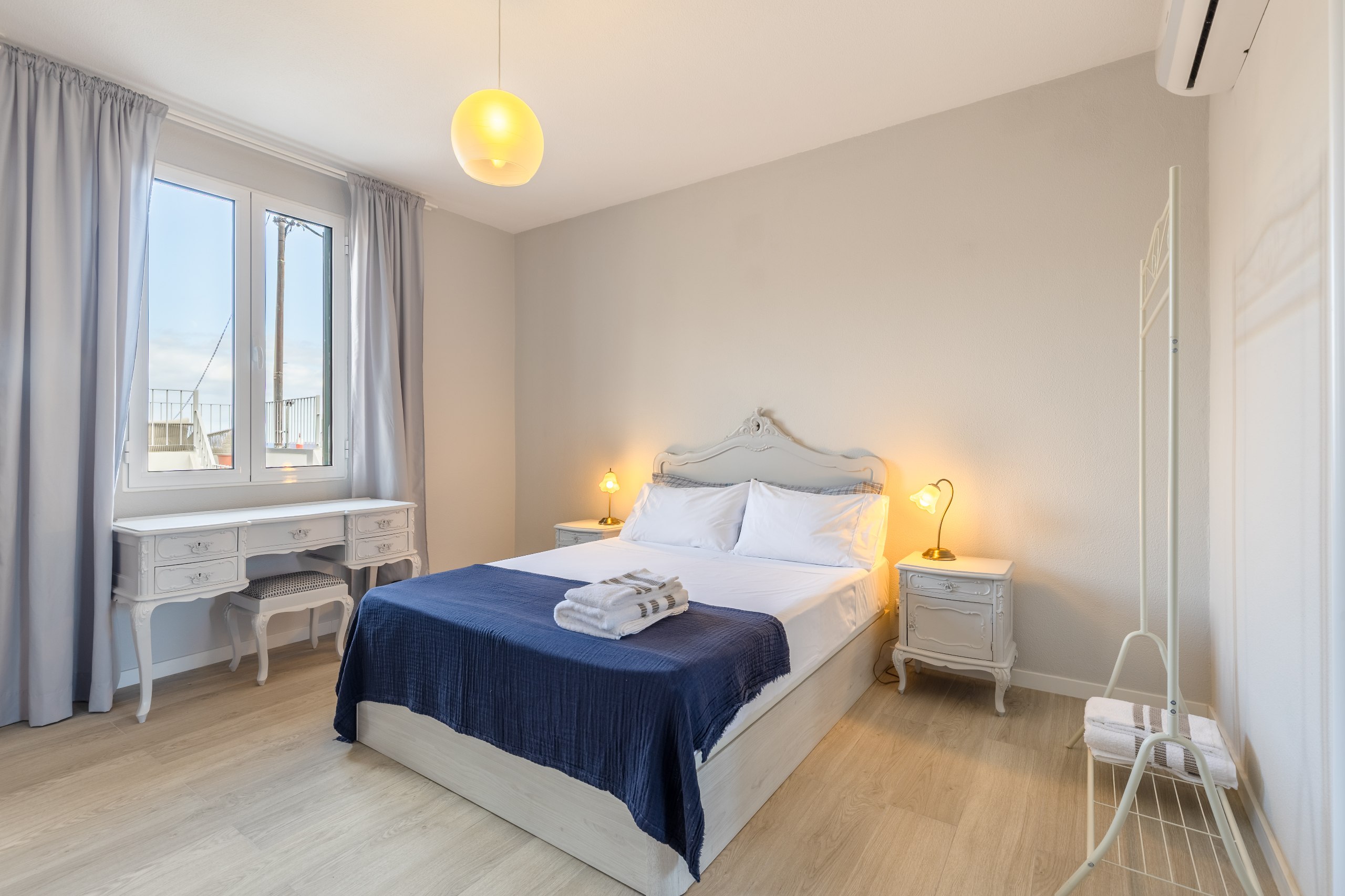 Bedroom with a double bed and window