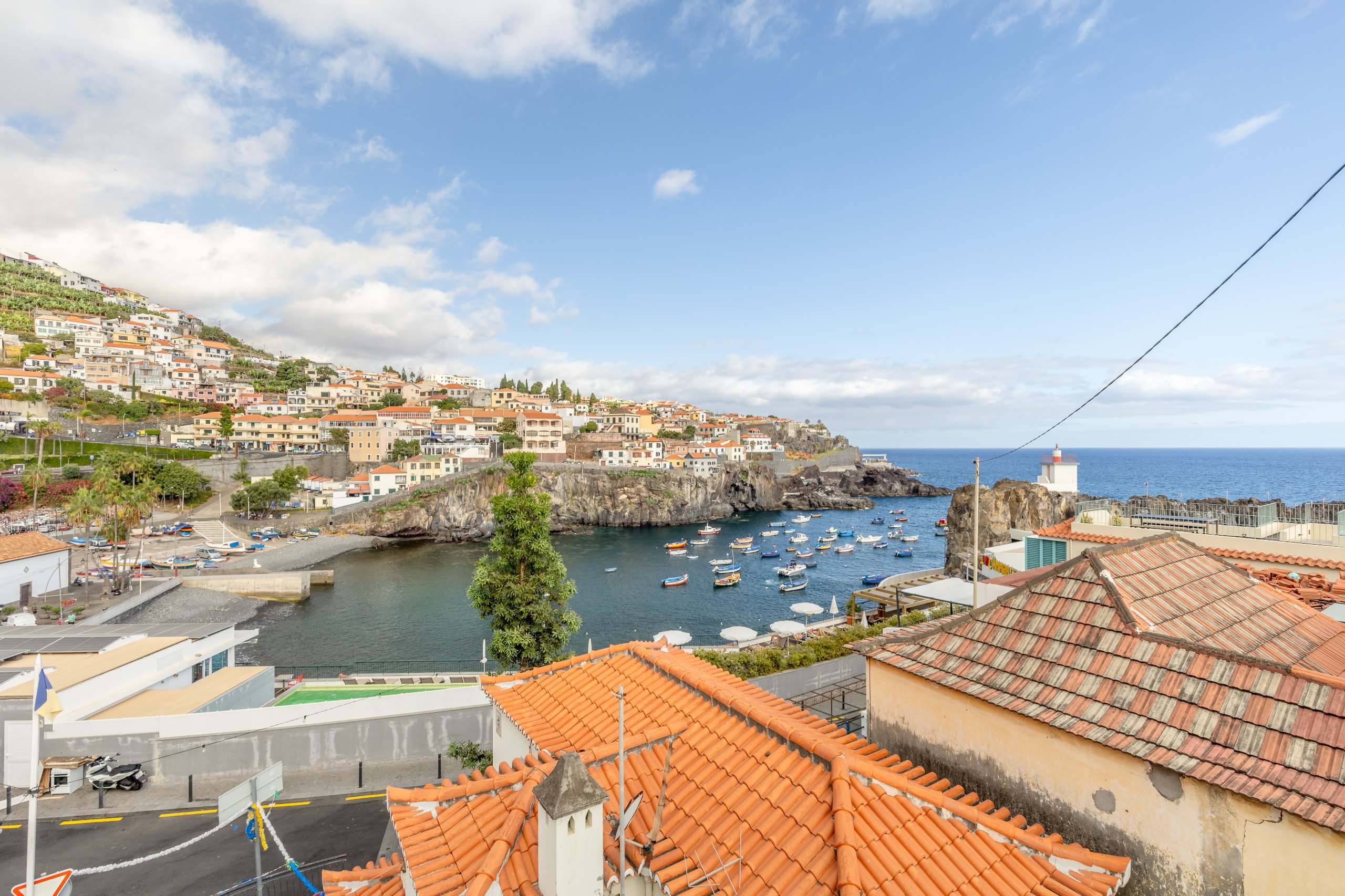 View over the harbour and rooftops of Câmara de Lobos